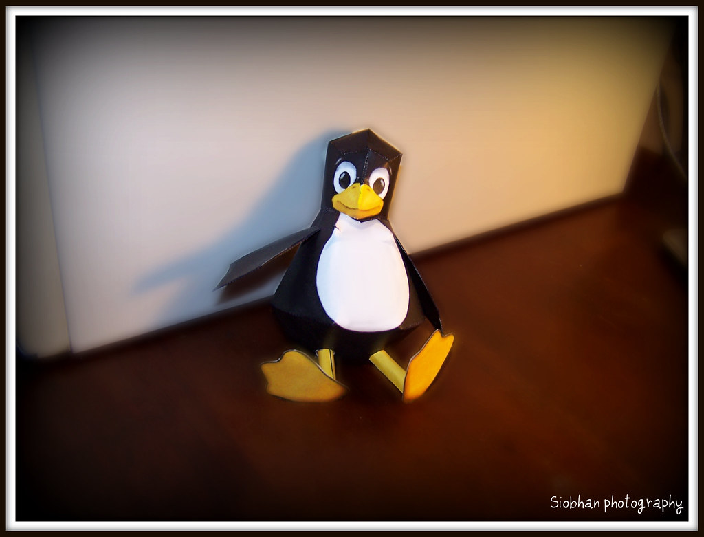 A small Tux the Penguin paper toy